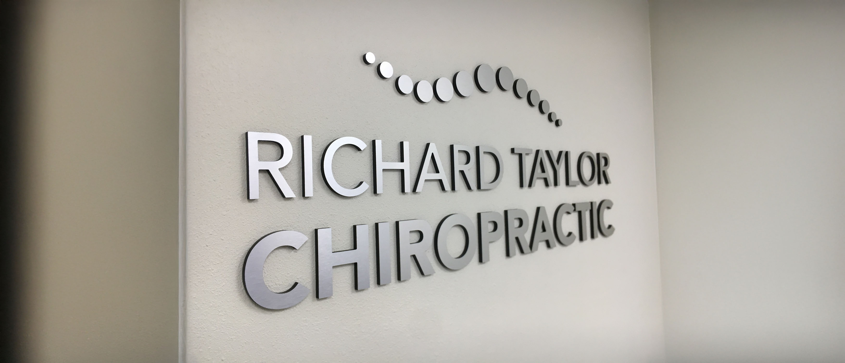 custom metal lobby sign